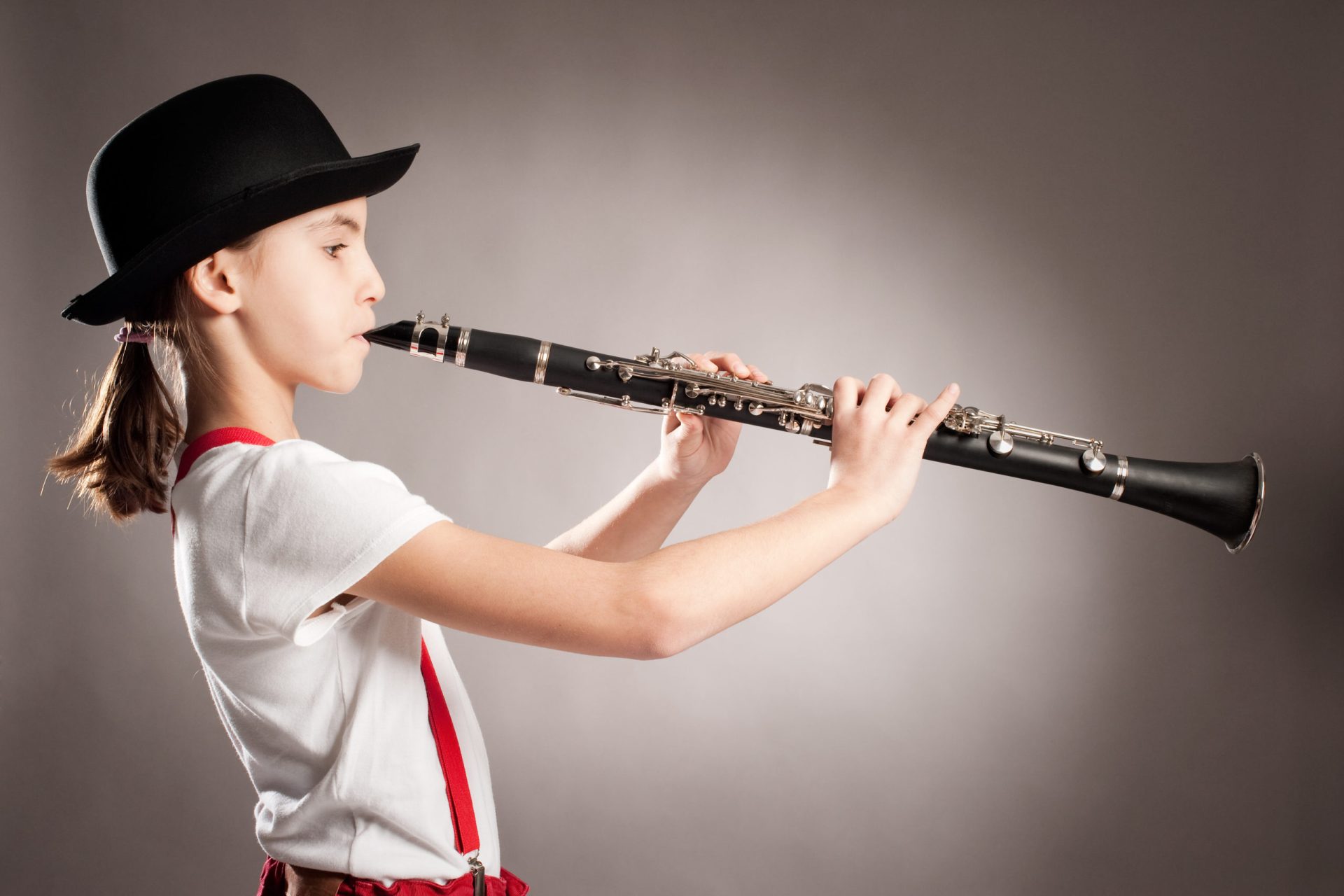 Young student playing the clarinet